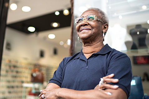 Older aged business woman looking in the distance